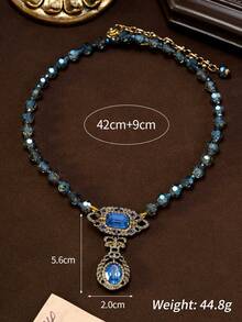 这款复古镂空水滴造型的宝石项链，设计新颖别致，尽显优雅奢华。它既能为高端下午茶增添一抹柔和的亮点，也能烘托复古舞会的酷炫氛围。无论是周年纪念晚宴、小众鸡尾酒会，还是复古主题市集，颈间那抹蓝色调都能让你在人群中脱颖而出。它完美契合复古宫廷风爱好者的精致品味，是一款能够瞬间提升日常穿搭格调的绝佳项链。 - 彩色 - 查看 5