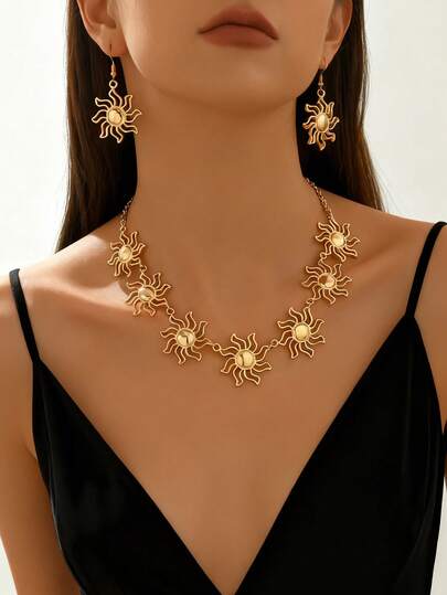 一套波西米亚风向日葵项链耳环套装，镂空花朵吊坠项链和耳环，适合日常、旅行、派对、节日等场合佩戴。