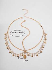 时尚简约的扇贝形合金金属链，搭配流苏和水晶几何圆形吊坠项链，适合女性佩戴。可作为派对礼物（手工制作，链长可定制，水晶数量不限），也可作为头饰、准新娘礼物或女士发饰。