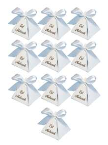 10个开斋节主题白色金字塔形礼盒，金色“Eid Mubarak”书法字体，搭配撞色缎带蝴蝶结，是开斋节派对礼品袋、伊斯兰节日装饰、奢华节日礼品、新娘送礼会回礼的完美之选。 - 7.5x7.5x7.5cm - 查看 9