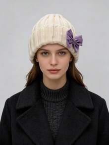 2025 女士冬季针织帽 - 柔软保暖的腈纶羊毛混纺罗纹针织帽，饰有优雅的紫色天鹅绒蝴蝶结，是秋冬休闲和通勤装扮的时尚必备单品，均码适合大多数成年人，有浅蓝色/橙色/粉色可选，适合寒冷天气和叠穿。 - 彩色 - 查看 16