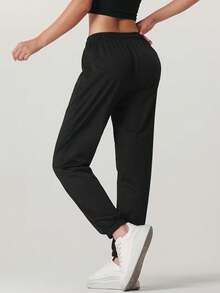 Women's Solid Color Elastic Waist Jogger Pants, Lightweight Casual Sports Pants With Pockets, Suitable For Yoga, Running, Daily Wear, Easy Care Fabric, Spring/Autumn Black - Black - View 2