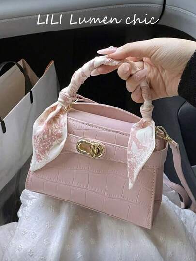 This Simple Yet Stylish Tote Bag Is Made Of PU Fabric And Features A Single Handle, Turn-Lock Closure, And Scarf Embellishment. It's Both Fashionable And Elegant, Making It Perfect For Women, Female College Students, Commuters, And Various Occasions. It Also Makes An Excellent Gift For Friends And Family.