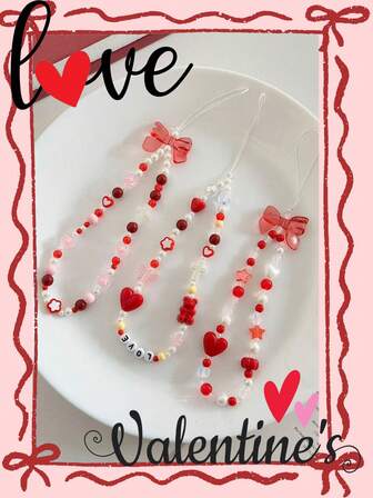 1 st. kärlek alla hjärtans dag begränsad upplaga hjärtformat flugahänge, mångsidig nisch original hjärtformat telefonsnodd, kamerarem, telefonfodralberlock