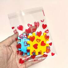 100个情人节红色爱心图案礼品袋，爱心和红唇透明自粘袋，5合1混合套装，充满爱意和浪漫氛围 - 适用于情人节、婚礼、生日、周年纪念日和其他场合。 - 彩色 - 查看 11