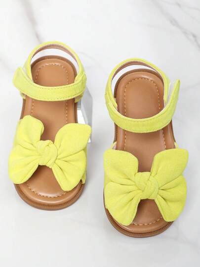 简约风女童蝴蝶结装饰百搭经典可爱魔术贴包头凉鞋，公主学步鞋，圆头软底鞋，春夏秋冬皆宜