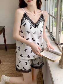2 pièces Ensemble pyjama femme, débardeur et short décontracté ample, imprimé nœud, tenue de détente confortable, tissu facile d'entretien - Noir et Blanc - Voir 4