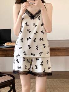 2 pièces Ensemble pyjama femme, débardeur et short décontracté ample, imprimé nœud, tenue de détente confortable, tissu facile d'entretien - Noir et Blanc - Voir 3