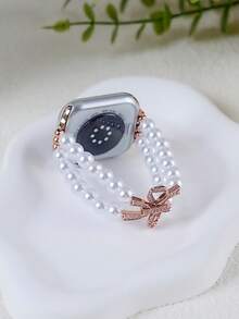 1条全新高端双排珍珠弹力表带，兼容，尺寸涵盖38mm、40mm、41mm、42mm、44mm、45mm、46mm、49mm，女士时尚款式，也兼容UltraS10/S11/9/8/7/6/5/4/3/2/1智能手环（不含手表）。是送给女友和朋友的最佳礼物，非常适合情人节、圣诞节、新年、母亲节、感恩节，也是给家人或朋友的惊喜礼物。 - 玫瑰金 - 查看 2