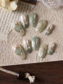 10片装亚克力按压式美甲，绿色猫眼银线短款假指甲，人造指甲套装，包含1张粘合贴片和1个迷你指甲锉。 - 彩色 - 查看 3