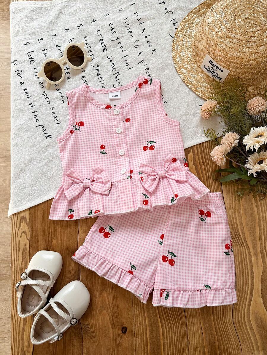 Bộ đồ 2 món cho bé gái, gồm áo hai dây màu hồng kẻ caro in hình quả anh đào và quần short kẻ caro cùng màu, kiểu dáng đường phố dễ thương, thích hợp đi học và mặc dạo phố. - Hồng - Xem 1
