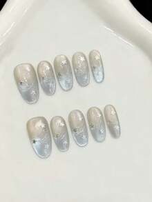 10片装中号椭圆形手工美甲贴片，适合派对和日常佩戴，浅蓝色、椭圆形、银色、星空、猫眼图案，闪亮耀眼，易于佩戴。10片装Y2K风格手工美甲贴片，适合女孩和女士在节日派对和日常佩戴。 - 淺藍色 - 查看 8