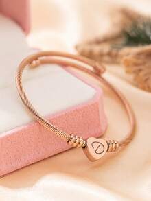 1 Vòng tay chữ cái đầu hình trái tim cho bé gái Vòng tay chữ cái đầu hình trái tim có thể điều chỉnh cho bé gái Vòng tay trang sức hình trái tim có thể điều chỉnh cho bé gái (Lưu ý: Do các lô sản xuất khác nhau, có thể có một số khác biệt về màu sắc) - Nhiều màu - Xem 27