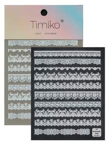 一款复古精致的美甲贴纸，采用浮雕纹理，主要由白色蕾丝制成，包括波浪边缘、花卉图案、镂空图案和其他蕾丝款式，适合个人DIY和打造法式新娘美甲风格。