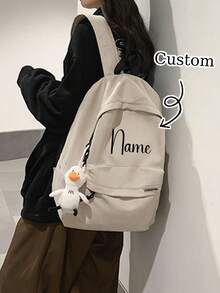 Ba lô đôi cá nhân hóa với mặt dây chuyền hình ngỗng trắng nhỏ trên dây đeo vai, có thể tùy chỉnh tên. Thiết kế dung tích lớn, lý tưởng cho du lịch, dã ngoại, leo núi và cắm trại. - Nhiều màu - Xem 3