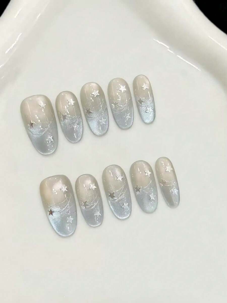 10片装中号椭圆形手工美甲贴片，适合派对和日常佩戴，浅蓝色、椭圆形、银色、星空、猫眼图案，闪亮耀眼，易于佩戴。10片装Y2K风格手工美甲贴片，适合女孩和女士在节日派对和日常佩戴。