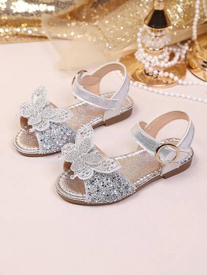 1 đôi dép xăng đan đế bằng kiểu công chúa dễ thương, ngọt ngào dành cho bé gái, bền, nhẹ và thoải mái, phù hợp cho tiệc tùng, họp mặt và mặc hàng ngày.
