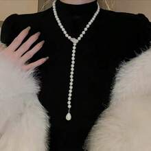 1 件装女士免打理珍珠毛衣链，波西米亚复古风长款可调节串珠项链，高端纯白项链，引人注目，是情人节礼物、日常配饰和派对佩戴的完美之选，百搭各种服饰。 - 白色 - 查看 1