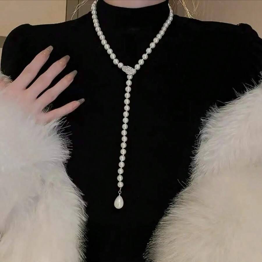 1 件装女士免打理珍珠毛衣链，波西米亚复古风长款可调节串珠项链，高端纯白项链，引人注目，是情人节礼物、日常配饰和派对佩戴的完美之选，百搭各种服饰。 - 白色 - 查看 1