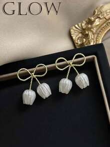 1 Đôi bông tai hình hoa tulip nơ độc đáo, tinh tế, cao cấp, thanh lịch, thích hợp cho các bạn gái đeo vào ngày Valentine, hàng ngày và các dịp lễ hội. - Cây cung - Xem 3