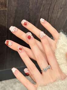 10片装短款棺材形手工按压式美甲贴片，适合派对和日常佩戴，粉色系，小草莓、粉色蝴蝶结、小花图案，闪亮耀眼，易于佩戴。10片装Y2K风格手工按压式美甲贴片，闪亮夺目，适合女孩和女士在节日派对和日常佩戴。 - 粉色 - 查看 4