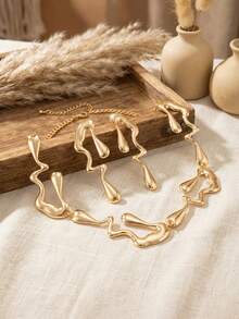 3件套奢华时尚液态金属水滴形设计铜质项链耳环套装，女士派对、宴会、约会、购物的最佳配饰，送给她的理想礼物 - 金色 - 查看 2