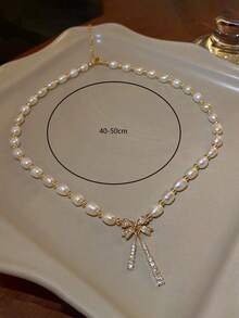 1 件优雅水钻蝴蝶结和人造珍珠流苏吊坠项链，适合女士，情人节派对礼物