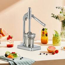 A Manual Juicer Made Of Stainless Steel, Designed For Extracting Juice From Large Citrus Fruits Like Oranges, Grapefruits, And Lemons. This Juicer Is Suitable For Both Commercial And Home Use, Easy To Clean, And Perfect For Juicing Fruits And - Multicolor - View 3