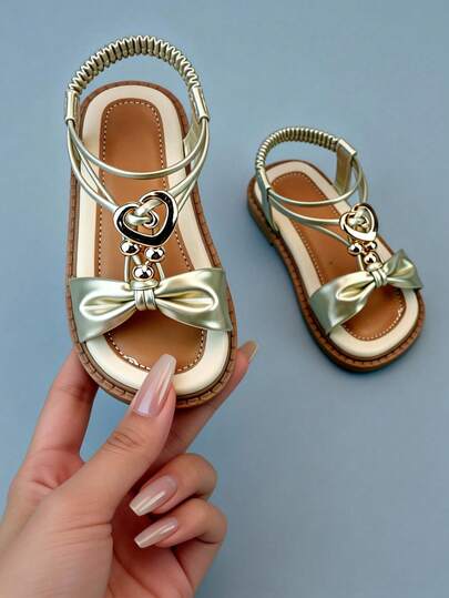 1 Pair Gold Heart Metal Bow Girls Sandals, Faux Leather, Non-Slip Flat, Ankle Strap, Sweet & Delicate Style, Summer Wear, Popular Net Red Item, High Praise Rate, Fashion Design, Soft Bottom, Comfortable, Ideal Children Sandals Gift