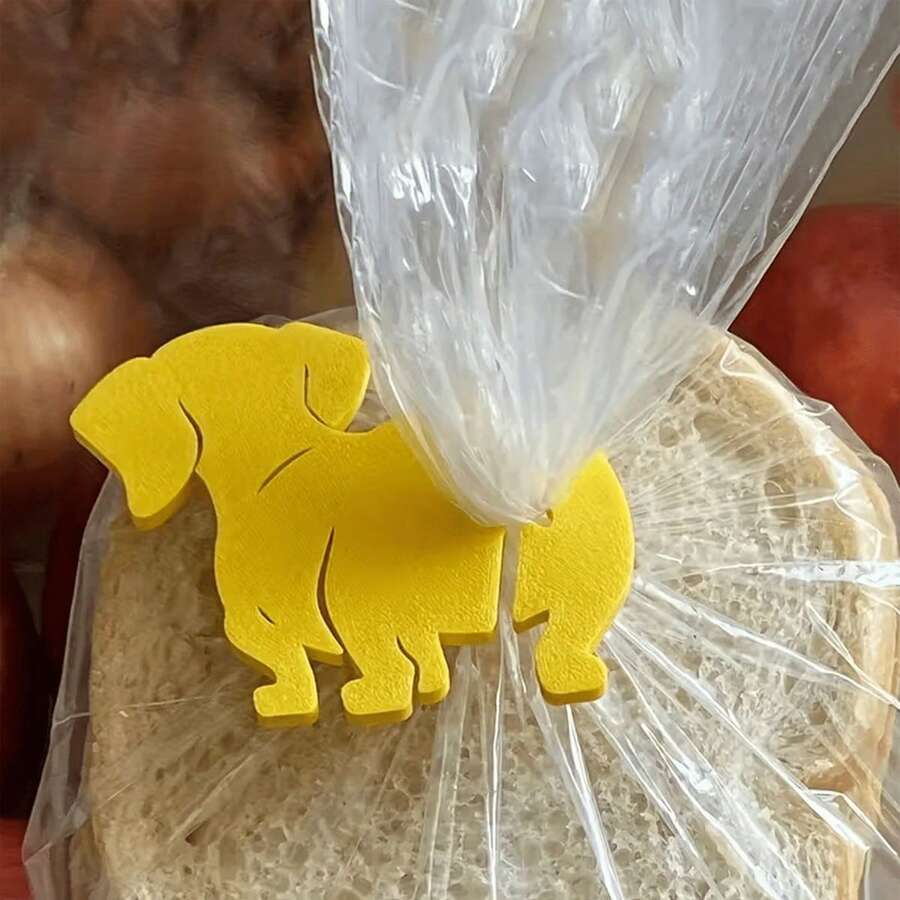 可爱腊肠犬造型包夹 - 可重复使用的塑料多用途包夹,骨头形状,多种颜色可选(黄、紫、绿、蓝、粉、橙、红、黑),适用于厨房、办公室、手工制作、宠物食品包装 - 送给爱狗人士的理想礼物,轻巧便携,可用于办公用品、工艺品收纳、趣味设计、坚固耐用、家居整理 - 彩色 - 查看 1