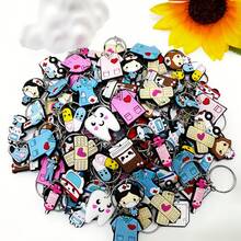 12个随机可爱医疗主题钥匙扣，护士、医生、卡通吊坠，医疗礼品/节日小礼物/安全教育日礼物，包包挂件，款式多样，DIY医疗可爱卡通不对称随机混合医疗系列钥匙扣，牙齿、牙膏、护士、医生、医疗盒、救护车、胶囊、绷带 - 彩色 - 查看 2