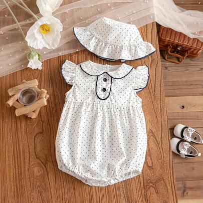 Bộ 2 món gồm áo liền thân tay bồng chấm bi dễ thương và mũ cho bé gái, thích hợp mặc mùa hè.