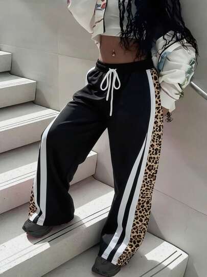 Damskie spodnie dresowe casualowe, minimalistyczne, młodzieżowe, w stylu uniwersyteckim, modne, dojazdy do pracy, sportowe, fitness, outdoor, szkoła średnia, studia, dla nastolatek, białe wykończenie z boku, nadruk w panterkę, czarne