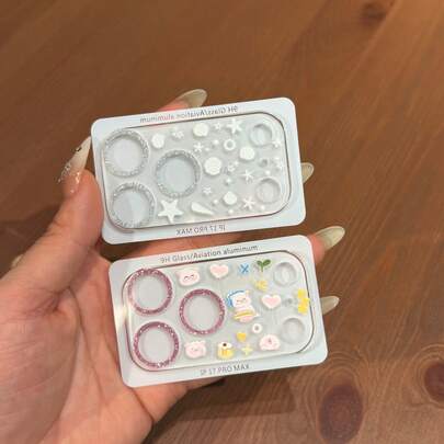 غشاء عدسة فضي لامع + ملصقات DIY، تشمل ملصقات صدفة وكوكب وقلب وخنزير، غشاء عدسة كاميرا فاخر لامع، مناسب لهاتف آيفون 17 برو ماكس/17 برو، غشاء واقي ناعم، غشاء زجاج مقسى