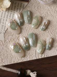 10片装亚克力按压式美甲，绿色猫眼银线短款假指甲，人造指甲套装，包含1张粘合贴片和1个迷你指甲锉。 - 彩色 - 查看 2