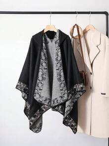 1 st. jacquard-poncho med huva