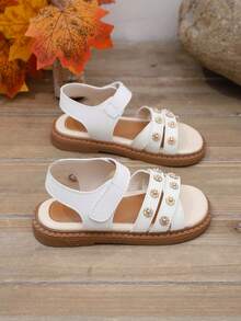 这款儿童白色铆钉凉鞋清凉休闲，适合夏季生活、休闲穿着、轻度正式场合、与玩伴约会、日常外出和户外聚会。 - 白色 - 查看 6