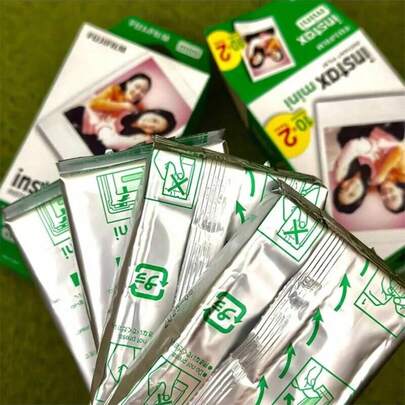 FujiFilm Mini Photo Paper, 10 Sheets, Colored Border, Sealed In Foil Packaging, Vibrant And Rich Colors, Wide Temperature Range (5-40℃), Compatible With Mini7s/8/9/11/12/25/90/Wide Models, White.