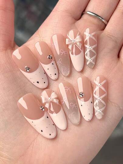 Valentine's Day Gentle Ballet Style 10-Piece Long Almond-Shaped Handmade Delicate Nail Tips. Hand-Painted Nude Pink Toned Ballet Shoes, French Cat Eye Straps, Striped Pink Bow, 3D Pink Bow, Pearl And Rhinestone Fake Nails. Shiny Press-On Nails, Removable, New Ballet Nails, Make Fingers Look Slender And Fashionable.