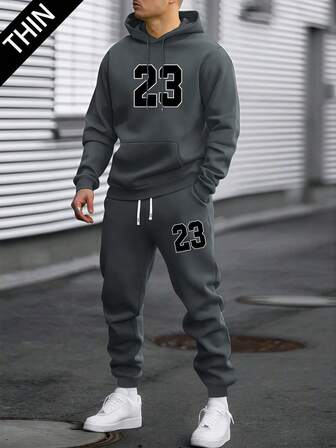 Lätt herrset med huvtröja och byxor, avslappnad outfit med numeriskt 23-tryck, tunt tyg för vår och höst, trendig träningsoverall med fickor och dragsko i midjan, perfekt present till make eller pojkvän