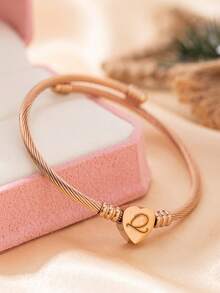 1 Vòng tay chữ cái đầu hình trái tim cho bé gái Vòng tay chữ cái đầu hình trái tim có thể điều chỉnh cho bé gái Vòng tay trang sức hình trái tim có thể điều chỉnh cho bé gái (Lưu ý: Do các lô sản xuất khác nhau, có thể có một số khác biệt về màu sắc) - Nhiều màu - Xem 13