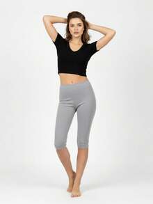 Women's Short, Fitted Leggings, Made With Stretchy Fabric, Featuring Anti-Exposure Shorts And Knee-Length, Lightweight Pants, Perfect For Comfortable And Form-Fitting Wear During Sports And Fitness Activities. - Tro - Xem 8