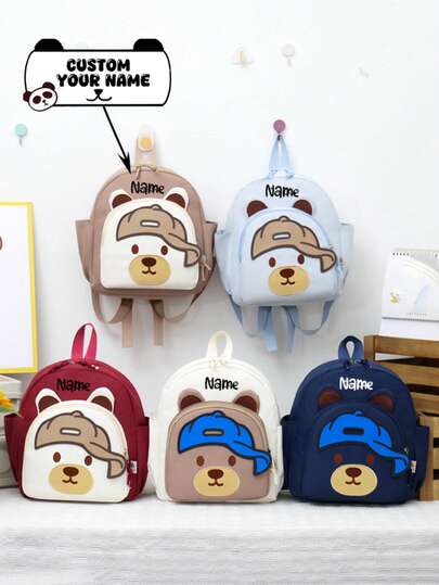 A Custom Hat Teddy Bear Cute Cartoon Backpack - Customizable With Personalised Name Or Holiday Wishes, Design, Available In Multiple Colours, Delicate And Stylish, Children's Backpack Cartoon Fashion Backpack, Perfect For Boys And Girls, Outdoor Activities And School Trips, Suitable For Everyday Use, Ideal Holiday Or Birthday Gift.