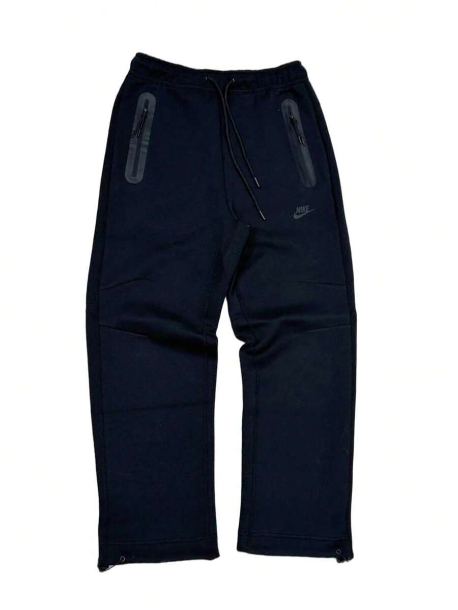 Pantalones deportivos de estilo técnico Nike unisex, pantalones de chándal, pantalones casuales - Negro - Ver 1