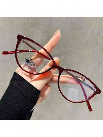 一副复古红色猫眼框眼镜，女士款，小巧时尚Y2K风格全框无度数眼镜，实用时尚的设计，提升您的职场形象。