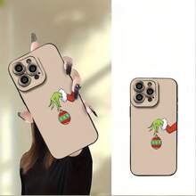 La mano del  con una bola de Navidad roja. Elemento de diseño de funda para teléfono,  ideal como regalo para cumpleaños, para mamá, familiares, amigos, novio o novia.   17 1 - Negro - Ver 2