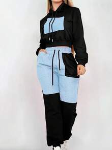 两件套女士时尚撞色连帽卫衣和拼接运动裤，打造潮流街头风穿搭，秋冬季节理想之选，适合女士冬季服装、圣诞节、新年、休闲装、派对、约会、婚礼、运动、海滩、万圣节、感恩节等场合。 - 黑色 - 查看 4