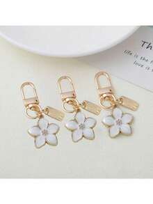 Delicado llavero de flor de cerezo de metal, ligero y elegante, adecuado para llaves de coche, carteras, bolsos, bolsos de mano, un regalo pensativo para niñas, estilo japonés, cumpleaños, Acción de Gracias, Navidad, recuerdo de fiesta - Blanco - Ver 1