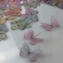 100个柔和粉彩透明蝴蝶装饰品，3D立体布艺逼真蝴蝶，3D网纱蝴蝶装饰，适用于DIY手工、美甲、摄影道具、DIY发夹，精致多用途，是美甲装饰、珠宝制作材料、手工活动、成人手工、家庭娱乐、女士配饰、女士礼物、服装装饰、蝴蝶贴纸、房间装饰、卧室装饰、个性化礼物的理想之选。 - 彩色 - 查看 9