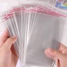 50pcs/Set Transparent OPP Self-Adhesive Plastic Gift Bags, Suitable For Party Favors, Jewelry Packaging, Halloween Gifts, Christmas Gift Bags - Clear - View 1